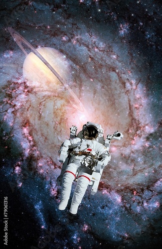 Fototapeta Naklejka Na Ścianę i Meble -  Astronaut Spaceman Saturn Spiral
