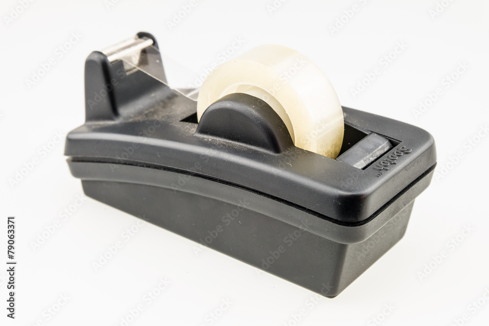 A scotch tape isolated against a white background A scotch tape isolated against a white background