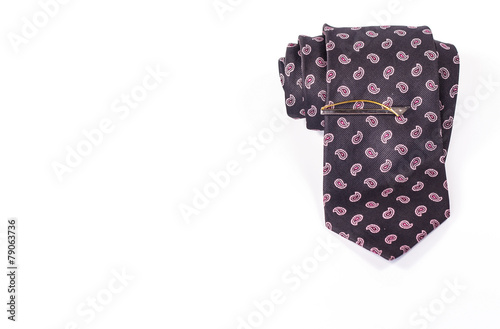 tie roll with tie clip isolated on white background.