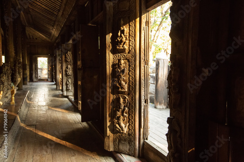 Ancient teak monastery of Shwenandaw Kyaung in Mandalay, Myanmar photo