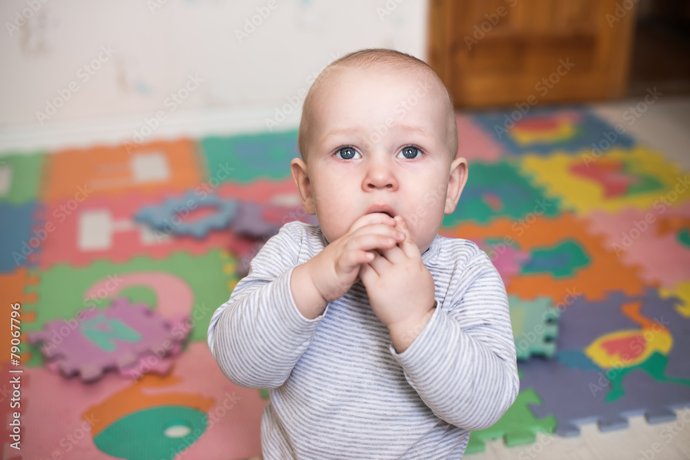Portrait of a crawling baby on the bed Portrait of a crawling baby on the bed