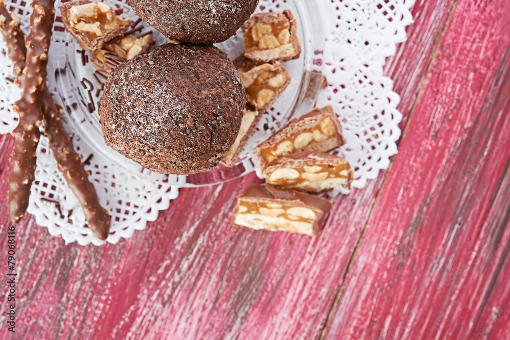 Cupcake with chocolate on wooden background Cupcake with chocolate on wooden background