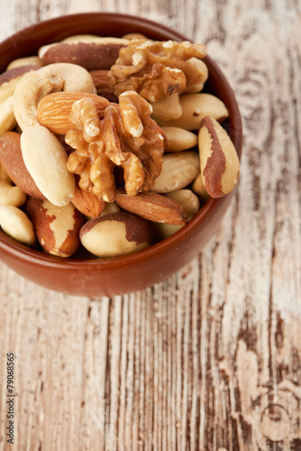 Mix nuts on wooden background