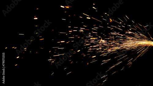 Glowing Flow of Sparks in the Dark photo