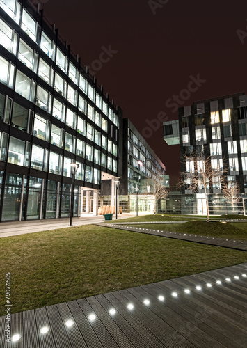 Modern business center in Warsaw at night, Poland. #79076505