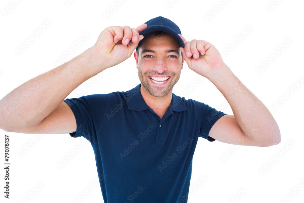 Smiling delivery man wearing cap on white background Smiling delivery man wearing cap on white background