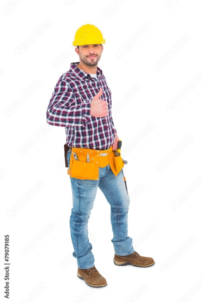 Smiling handyman gesturing thumbs up Smiling handyman gesturing thumbs up