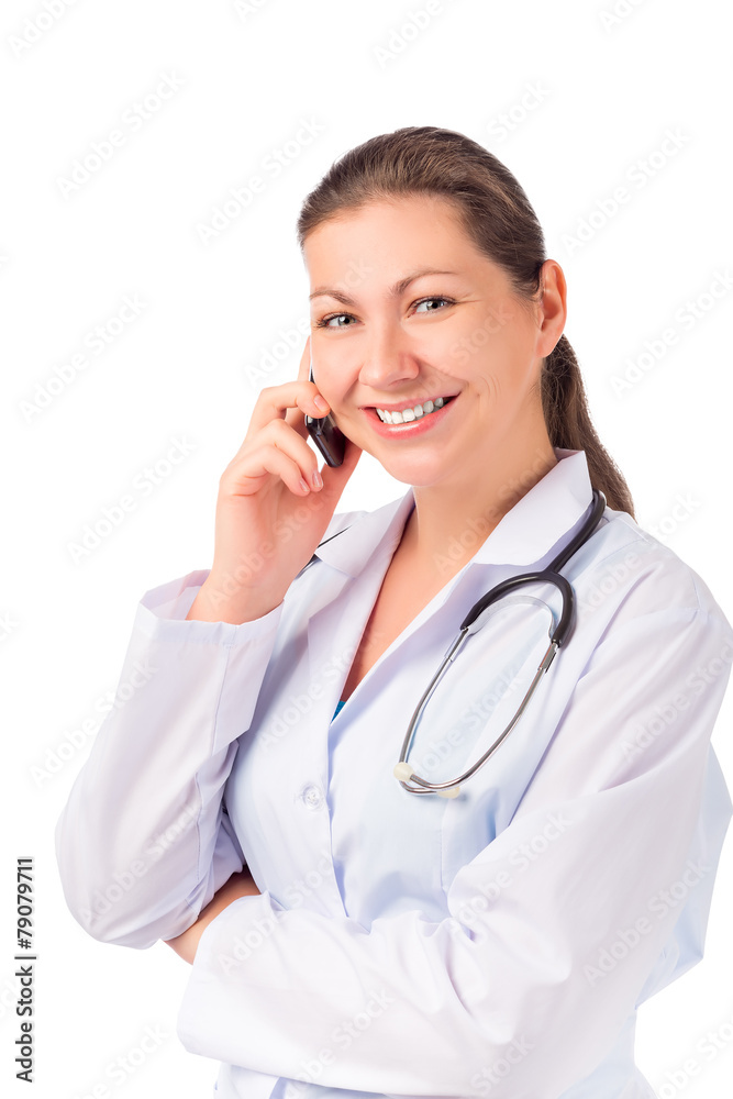 beautiful brunette Doctor with a phone on a white background beautiful brunette Doctor with a phone on a white background
