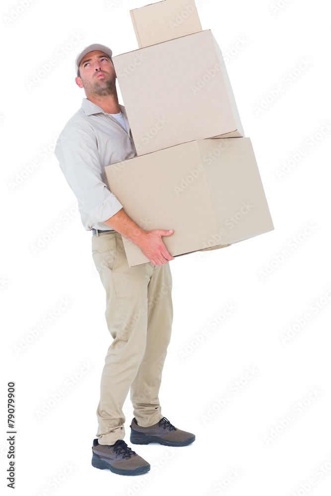 Tired delivery man carrying stack boxes Tired delivery man carrying stack boxes