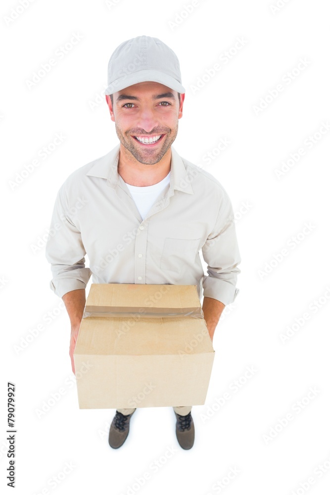 High angle portrait of handsome delivery man with cardboard box High angle portrait of handsome delivery man with cardboard box