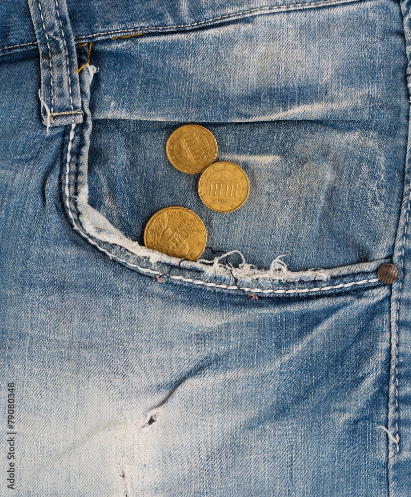 Old jeans with coins in pocket Old jeans with coins in pocket