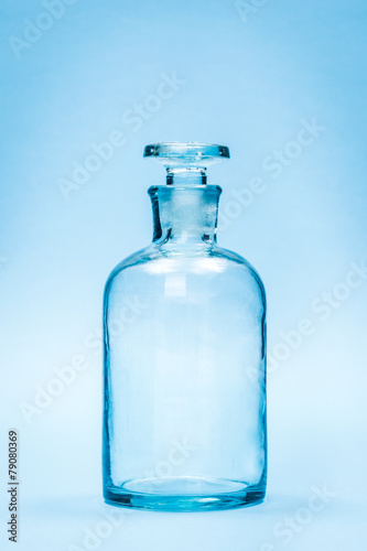 Empty clear reagent bottle with glass stopper