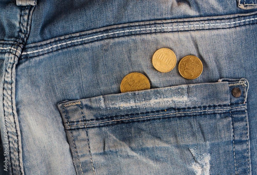 Old jeans with coins in pocket Old jeans with coins in pocket