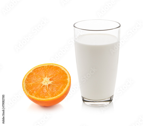 glass of milk with orange isolated on white