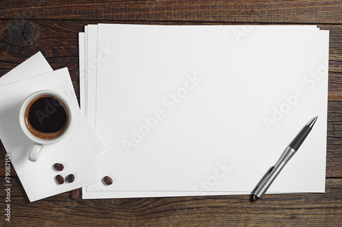 Blank sheet of paper and coffee