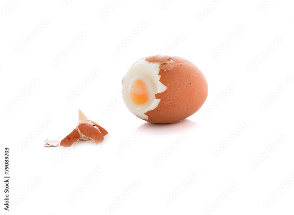 hard boiled egg with shell on white background hard boiled egg with shell on white background
