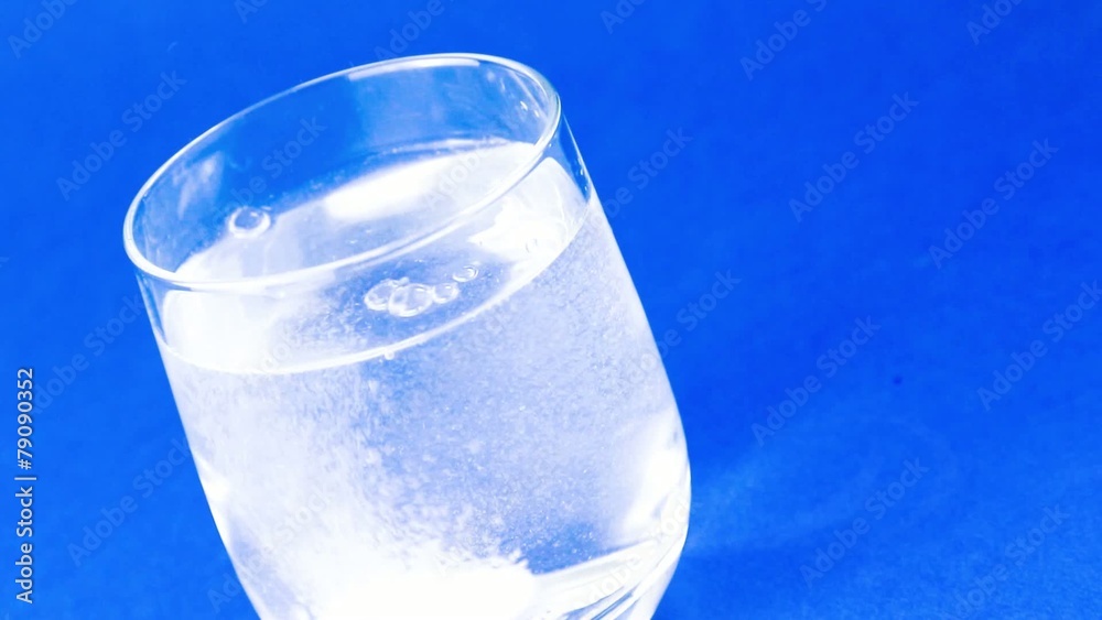 aspirin or effervescent pill tablet dropped into the water aspirin or effervescent pill tablet dropped into the water