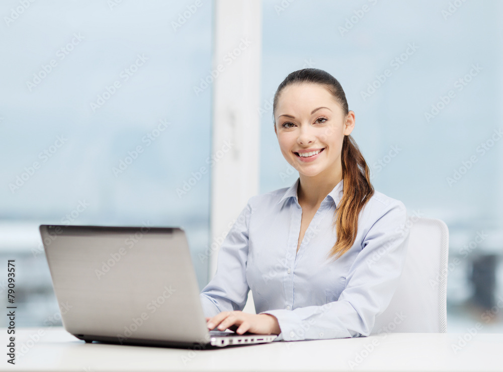 businesswoman with laptop in office businesswoman with laptop in office