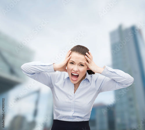 angry screaming businesswoman outdoors