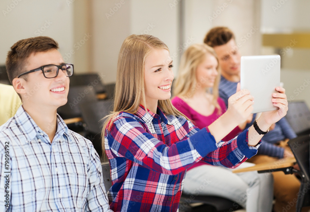 group of smiling students with tablet pc group of smiling students with tablet pc