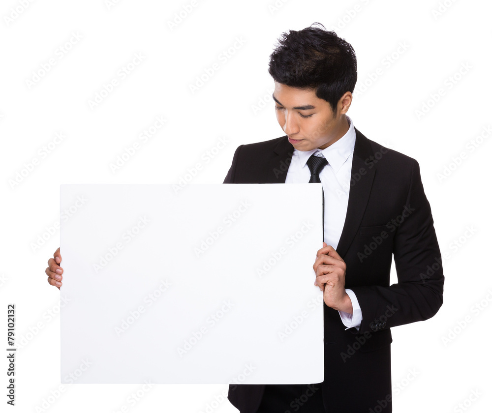 Mixed Indian businessman hold with white board Mixed Indian businessman hold with white board