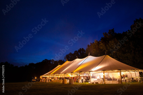 A wedding tent right after sunset