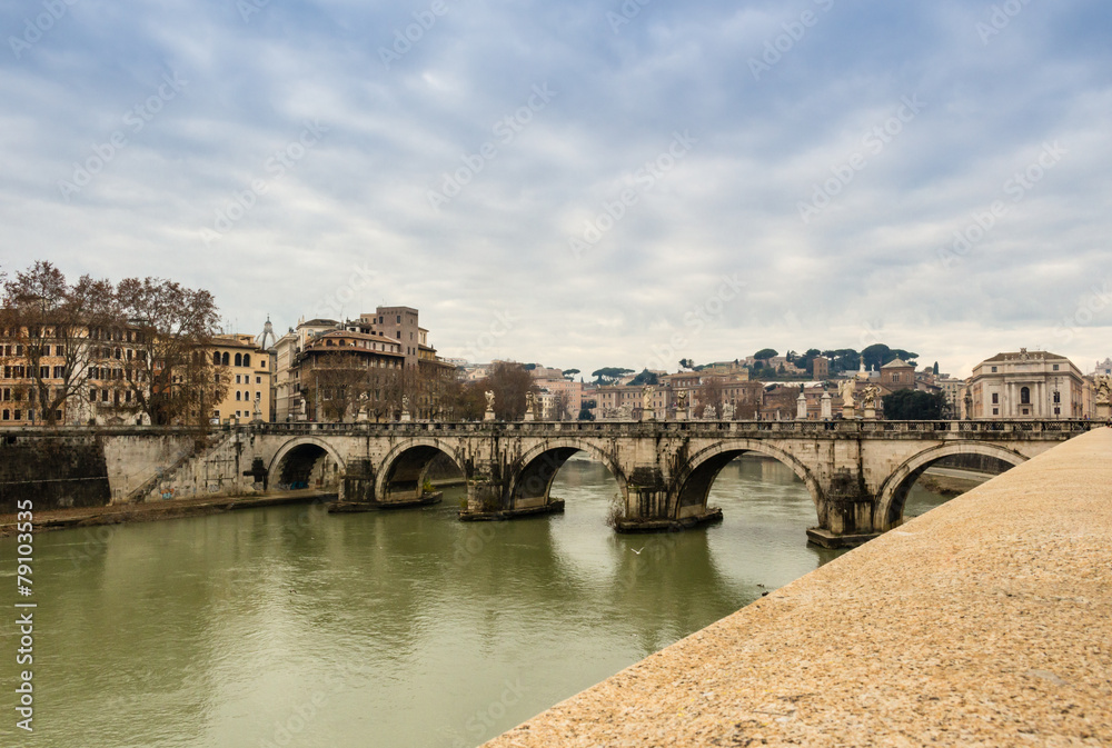 Bridge over the Tiber river in the center of Rome