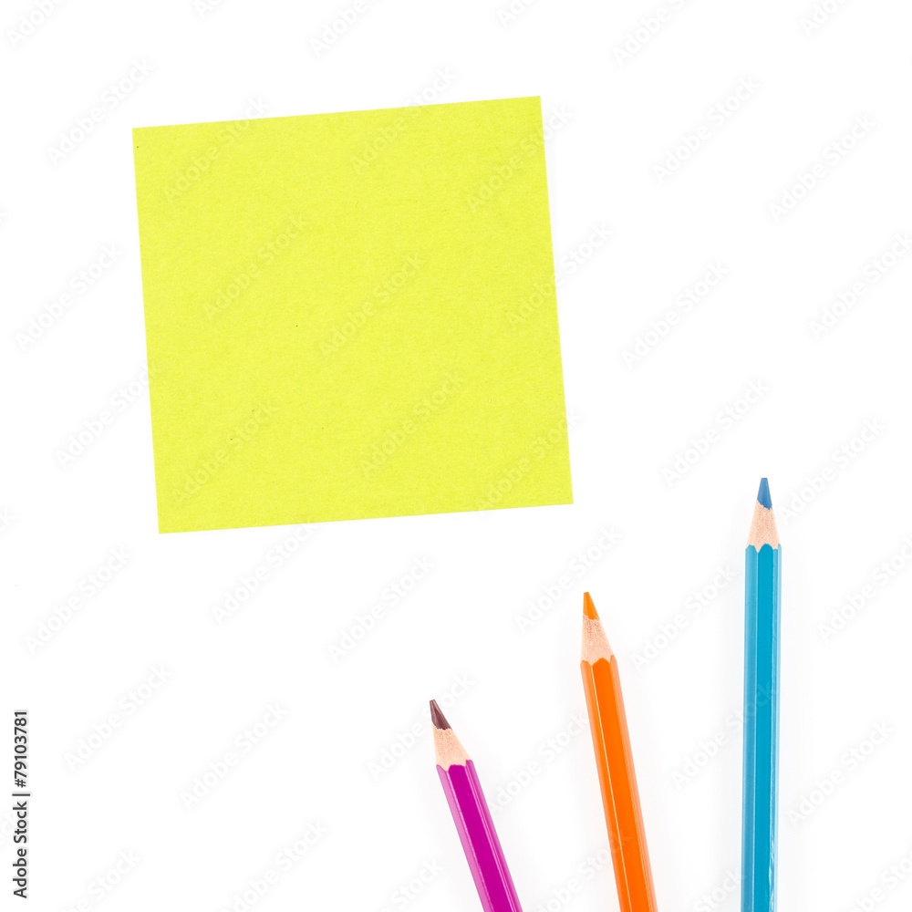Color pencils and sheet of paper Color pencils and sheet of paper