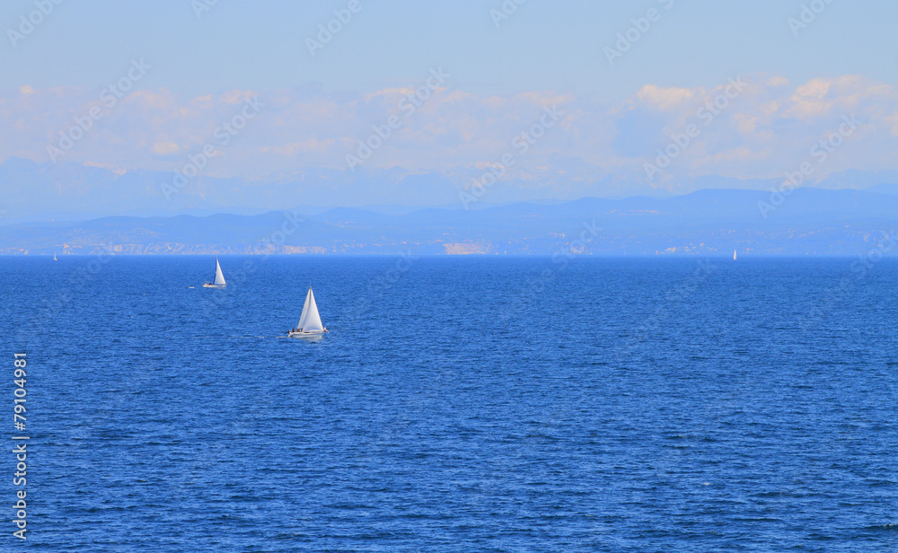 Sailing vessels in sea