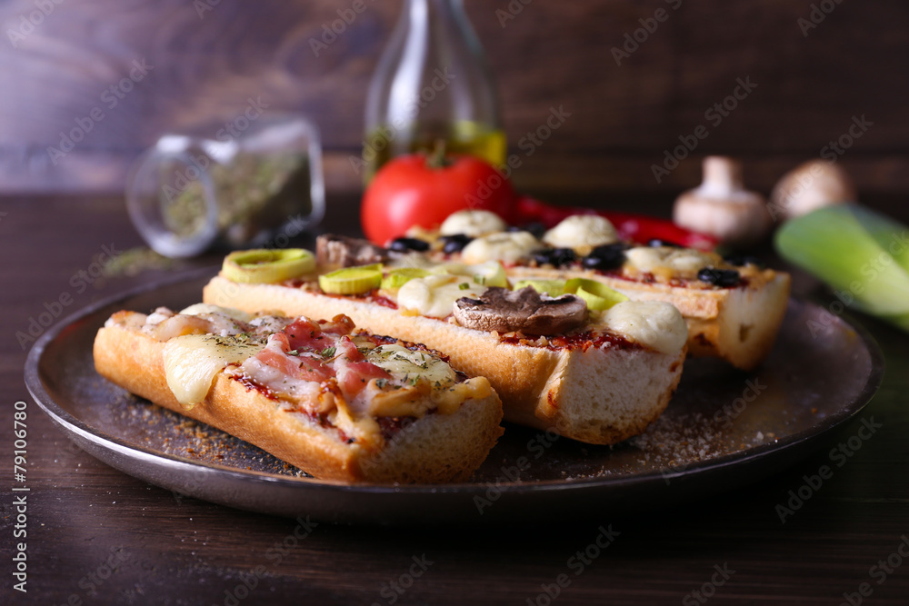 Different sandwiches with vegetables and cheese