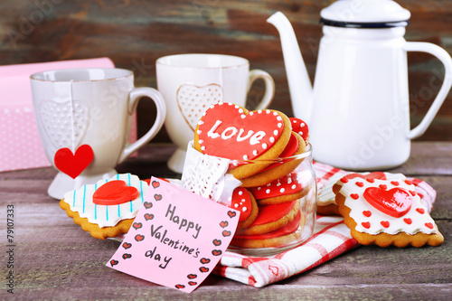Heart shaped cookies for valentines day, teapot and cups