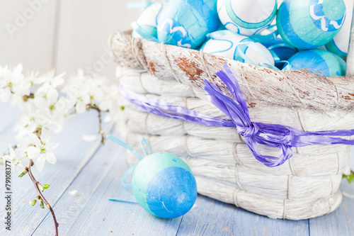Spring basket Easter eggs blue tone