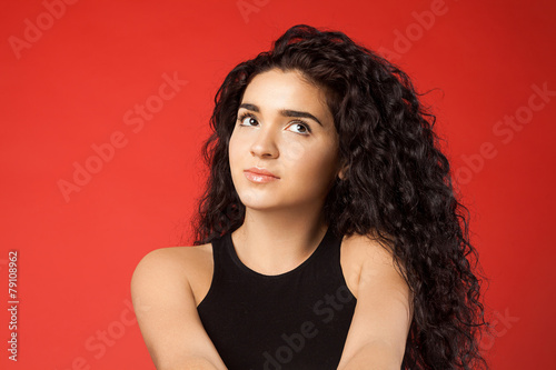 pensive beautiful girl with black hair