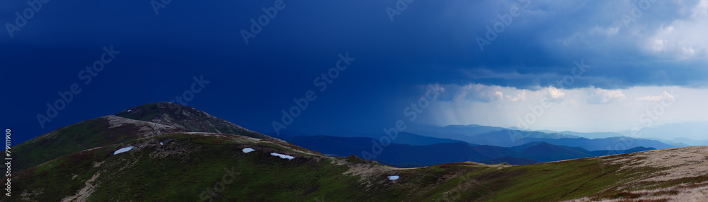 Stormy skies over the mountain Stormy skies over the mountain