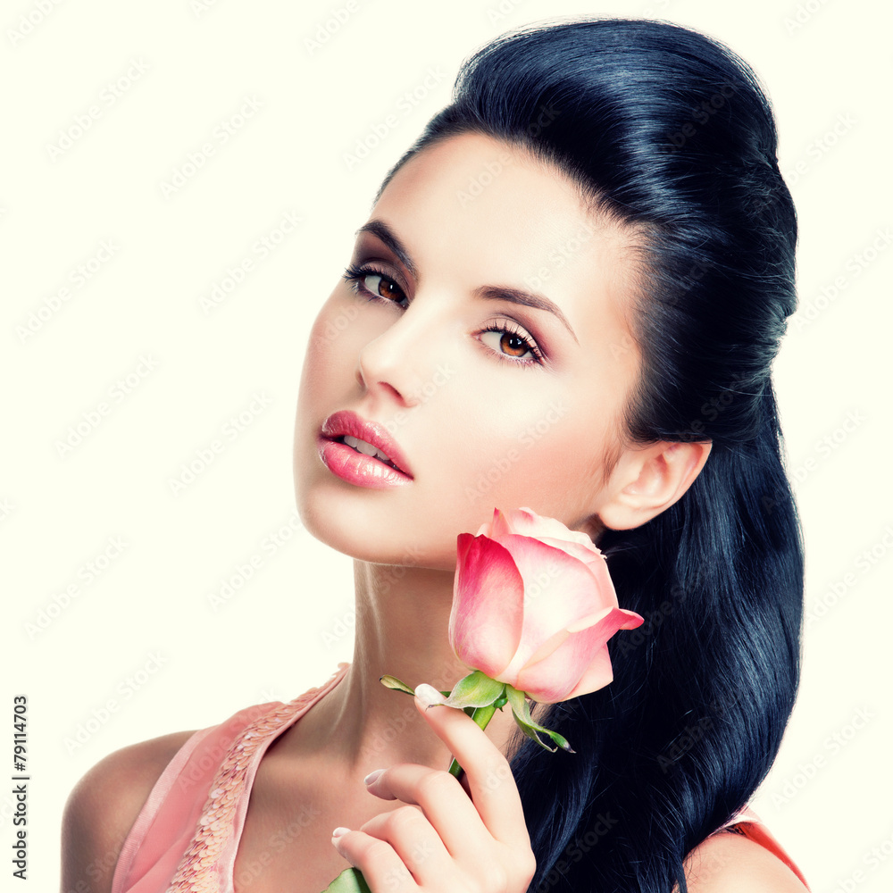 Sensual beautiful woman with pink rose.