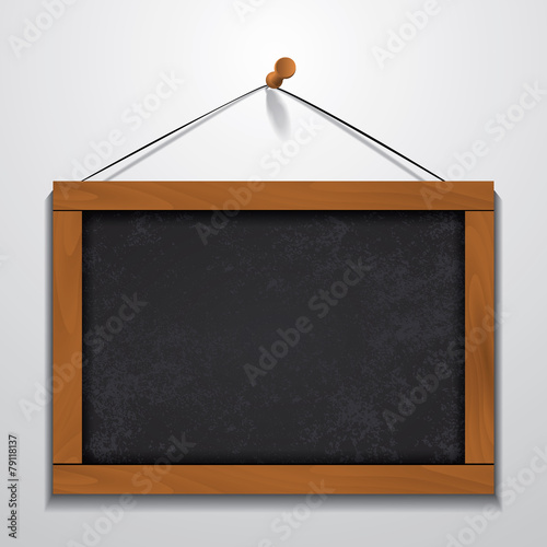 Chalkboard wood frame hanging on wall photo