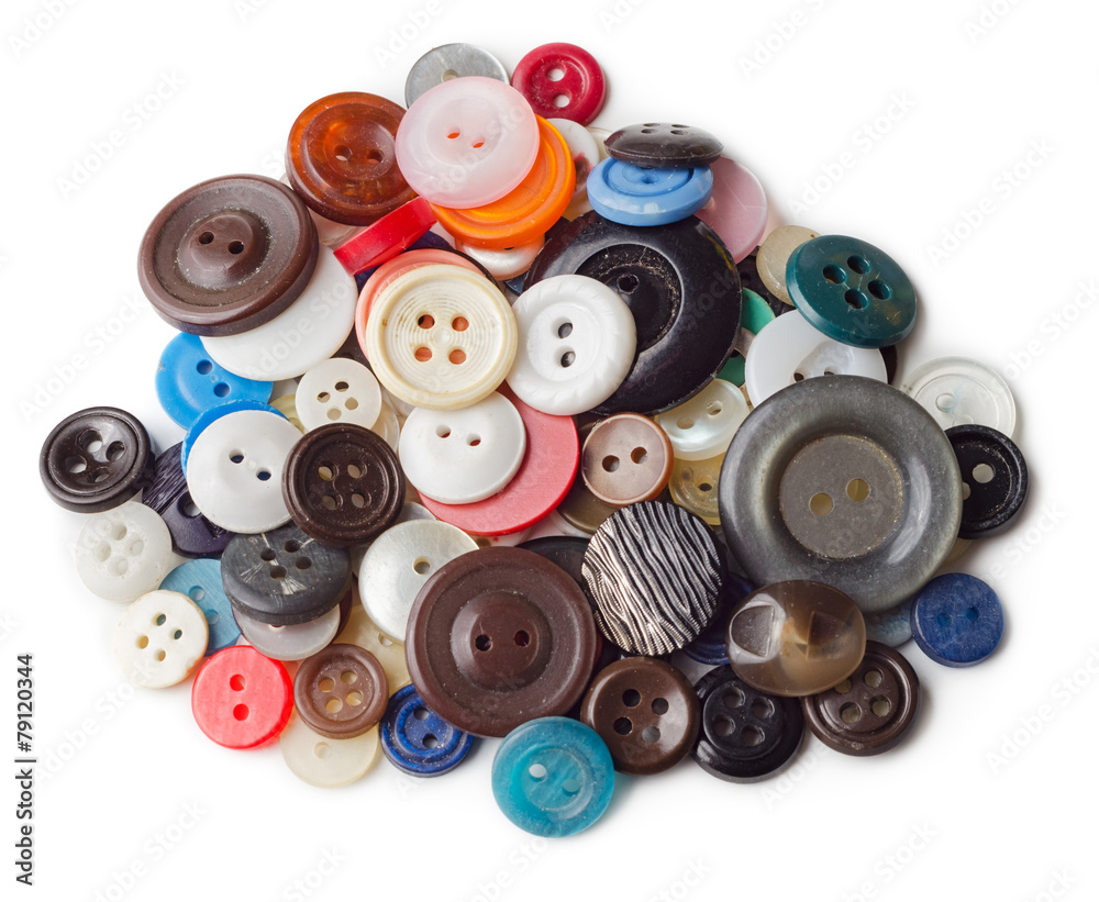 Pile of old and used clothes buttons Pile of old and used clothes buttons