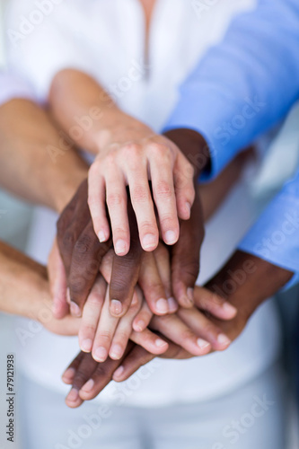 group of business people hands together