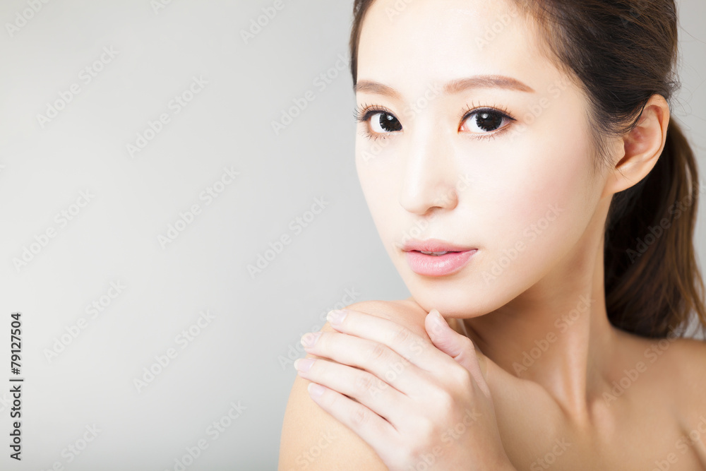 Naklejka premium closeup young beautiful woman face