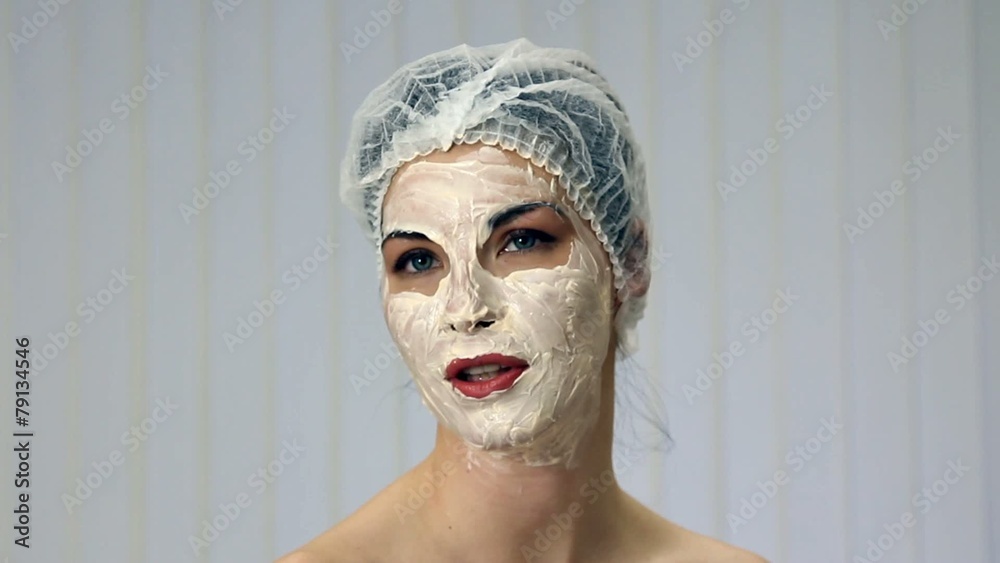 Relaxed woman with a face mask posing Relaxed woman with a face mask posing