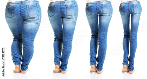 Woman in blue jeans isolated on white background photo