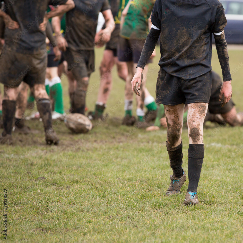 Rugby, muddy game of rugby, square cropped image Rugby, muddy game of rugby, square cropped image