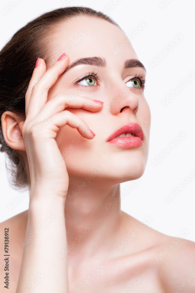 Young beautiful woman with day makeup and green pistachio colou Young beautiful woman with day makeup and green pistachio colou