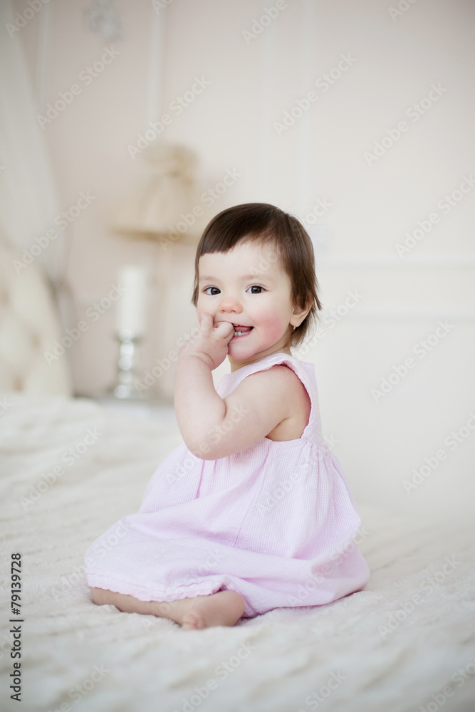 Portrait of a little sweet girl at home