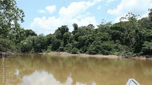 Traveling up Rio Shiripuno deep in the rainforest, Ecuad photo