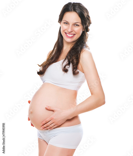 Happy pregnant woman touching her belly. Pregnancy