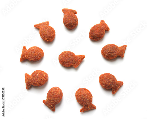 Cats dry food, fish shapes in circle isolated on white