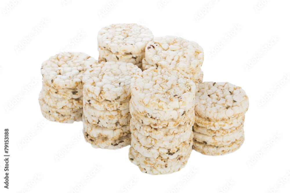 Mini puffed rice cake with cumin and salt isolated Mini puffed rice cake with cumin and salt isolated