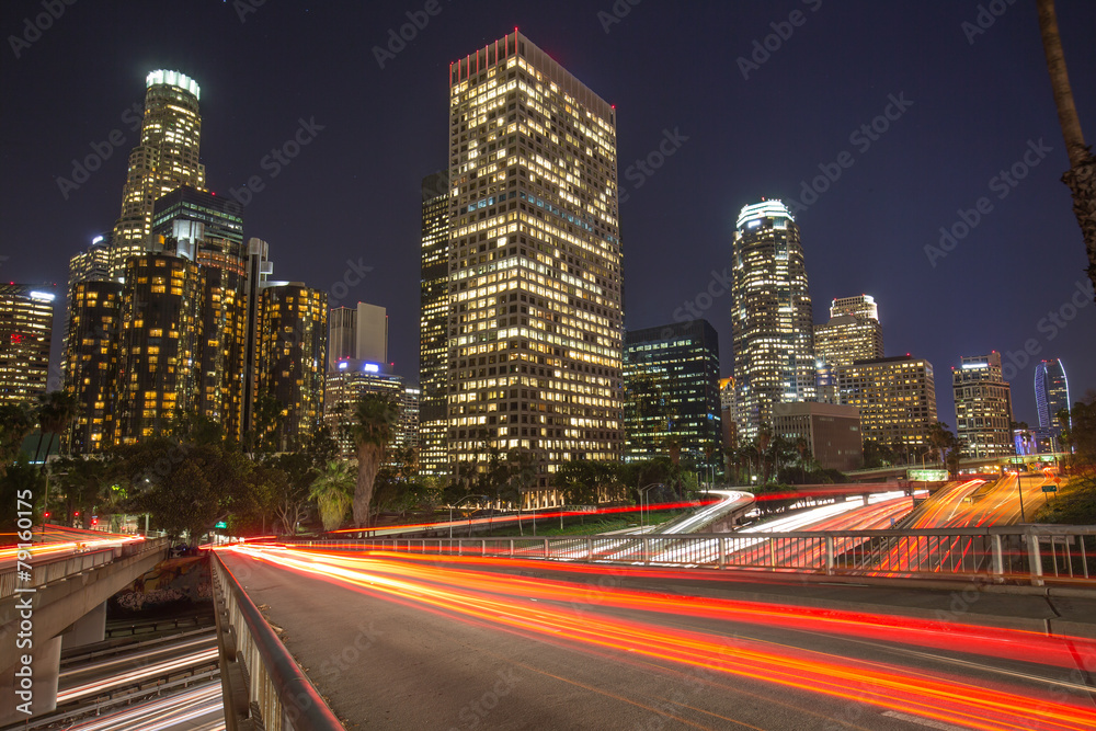 Los Angeles downtown buildings and highway traffic at night