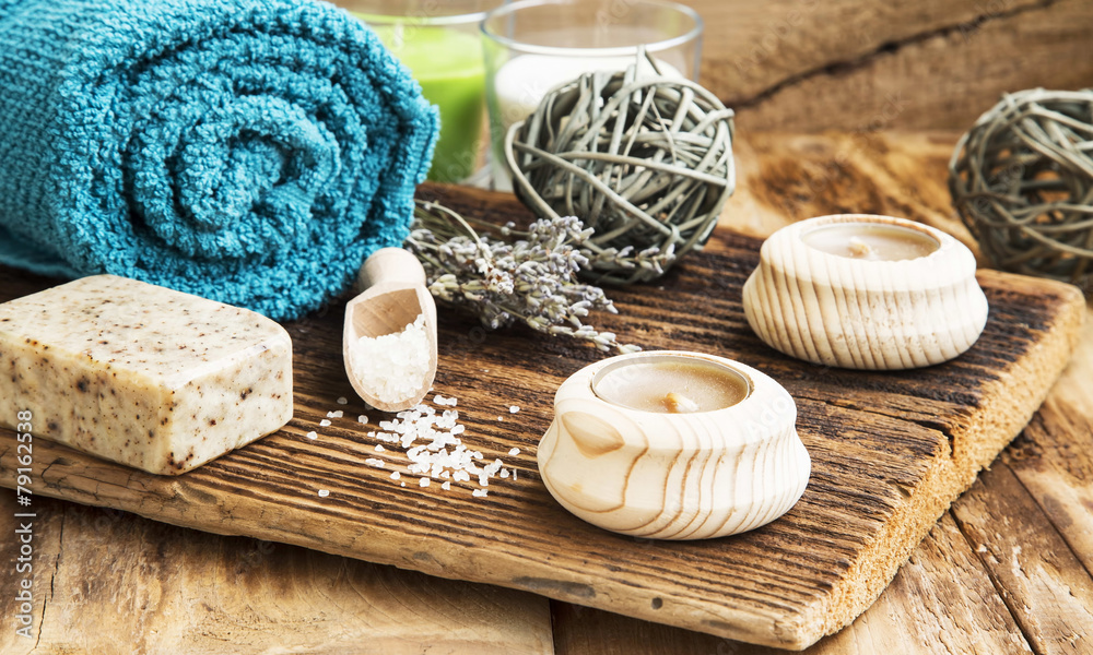 Spa and Wellness Setting on Wooden Background with Towel, Candle Spa and Wellness Setting on Wooden Background with Towel, Candle